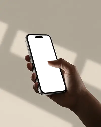 angled-iphone-16-mockup-in-hand-with-soft-shadows-and-modern-lighting