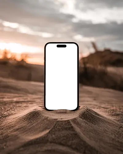 cinematic-iphone-15-mockup-on-sand-dune-in-golden-hour-seaside-desert-scene