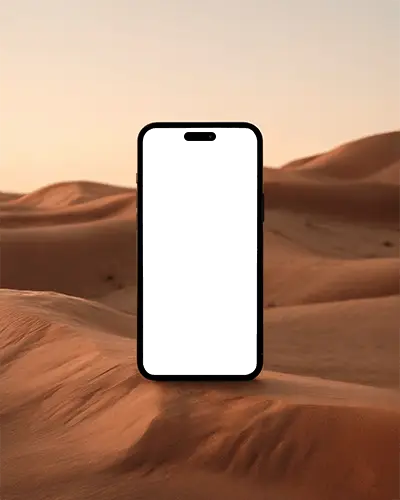 modern-iphone-16-pro-mockup-smartphone-standing-on-sand-dunes-at-sunset-with-warm-desert-light