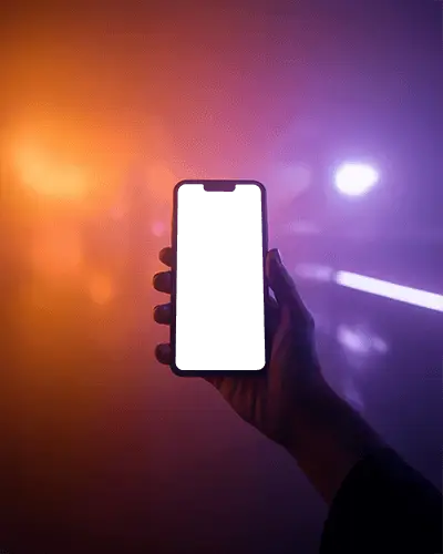 futuristic-iphone-13-mockup-hand-holding-smartphone-against-purple-and-orange-neon-lighting-scene