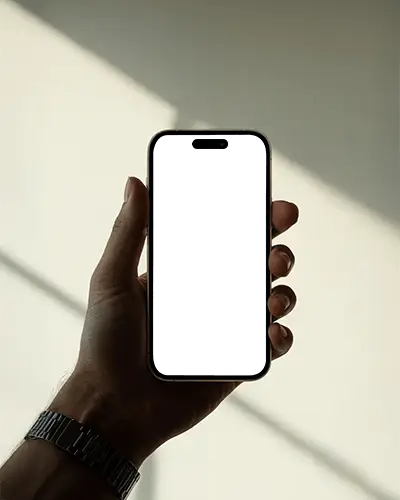 Warm Natural Light Iphone 16 Mockup Hand Holding Phone In Soft Minimal Sunlight