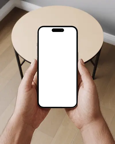 Realistic Iphone 16 Pro Mockup Held By Male Hands On Minimalist Interior Background