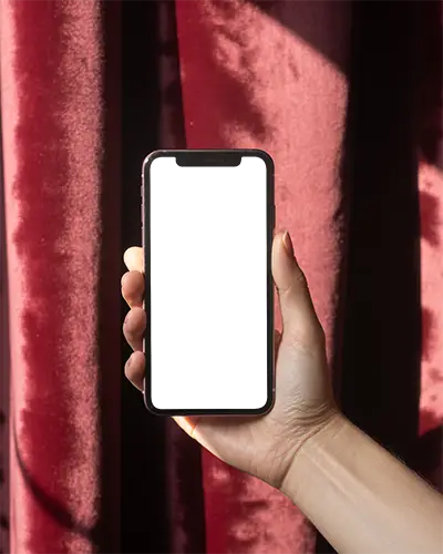 Hand Holding Iphone 12 Mockup With Blank Screen Against Textured Velvet Background