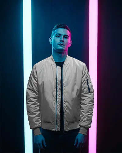 Neon Dual Light Bomber Jacket Mockup Male Model In Modern Studio Contrast