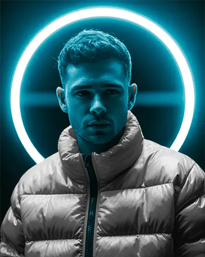 Blue Neon Halo Puffer Jacket Mockup Male Model In Bold Blue Glow Modern Studio