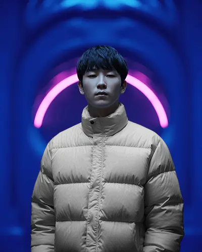 Premium Puffer Jacket Mockup Male Model Korean Cool Toned Ambient Light And Magenta Arc