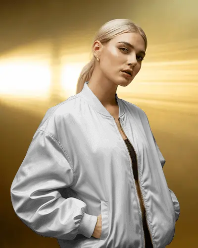 Golden Light Bomber Jacket Mockup Female Model Standing Relaxed Hands In Pockets Cinematic Style