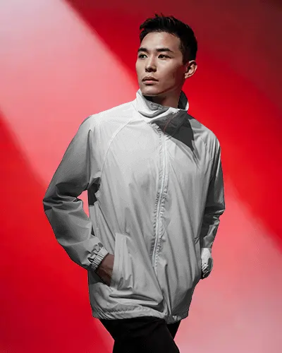 Red Light Windbreaker Bomber Jacket Mockup Male Model Looking Away Cinematic Studio Fashion