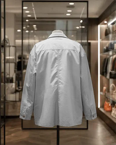 retail-showroom-jacket-mockup-stylish-back-angle-on-stand-in-contemporary-boutique-environment