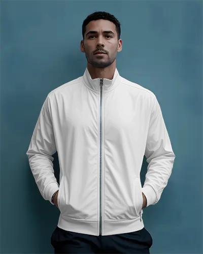 urban-style-jacket-mockup-male-model-front-view-hands-in-pockets-against-blue-wall-modern-fit