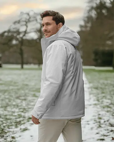 snowy-park-jacket-mockup-male-model-back-angle-wearing-hooded-winter-parka-outdoor-lifestyle