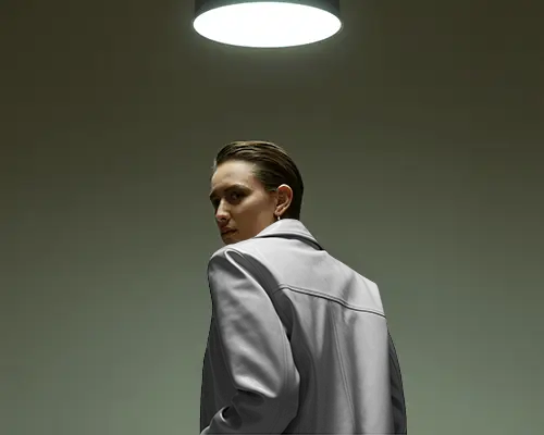 Moody Lighting Jacket Mockup On Model Turned Back Stylish Premium Display
