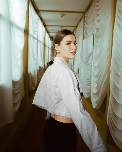 Stylish Short Jacket Mockup On Model In Draped Corridor Modern Chic Portrait