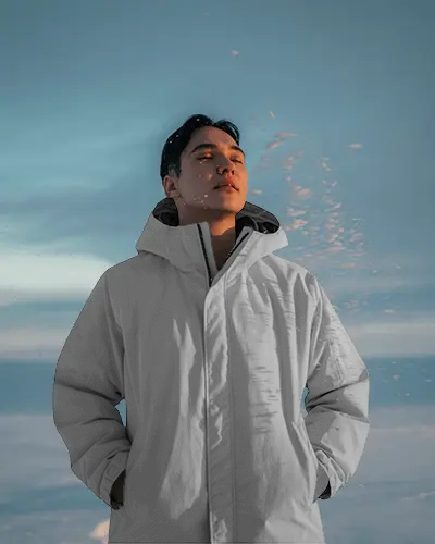 Serene Winter Jacket Mockup On Model Eyes Closed Under Soft Sunlight Calm Outdoor Look