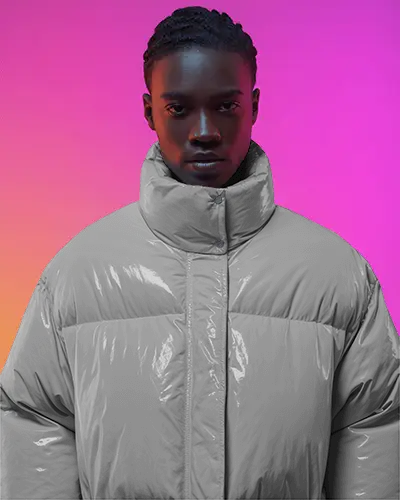 Neon Dusk Puffer Jacket Mockup Model Against Bold Gradient Light In Modern Studio