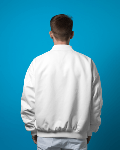 back-view-of-a-person-wearing-varsity-jacket-standing-in-front-of-blue-screen