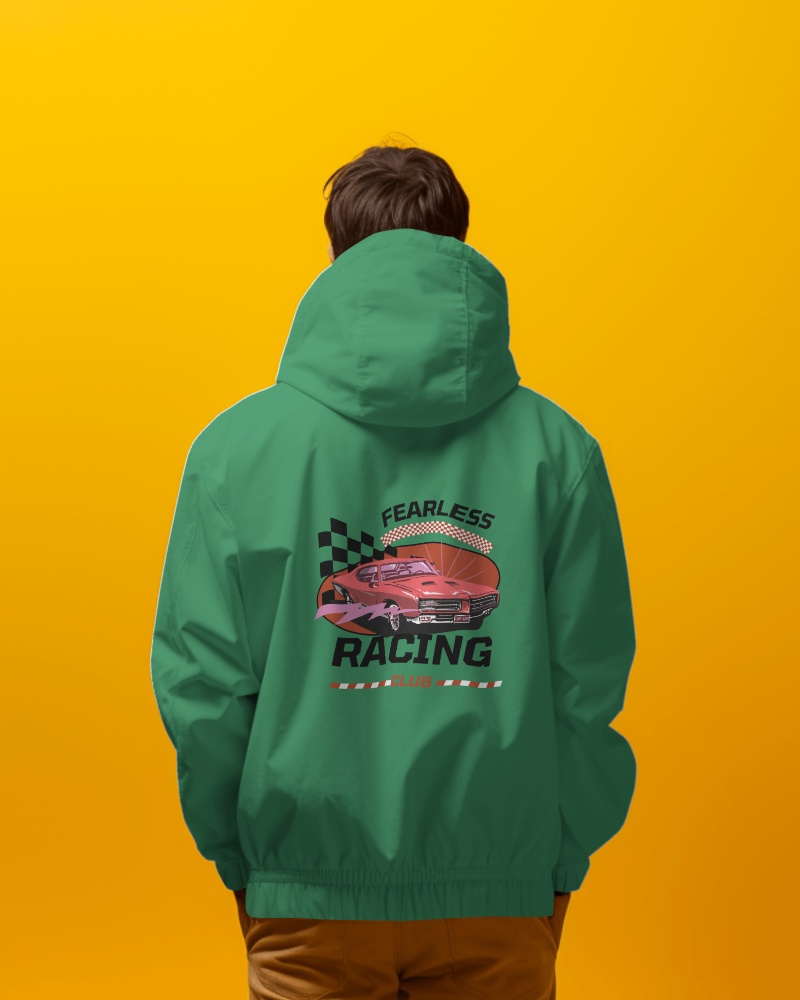 Person Wearing Jacket Standing In Front Of Yellow Screen Posing From Back