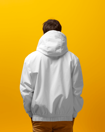 person-wearing-jacket-standing-in-front-of-yellow-screen-posing-from-back