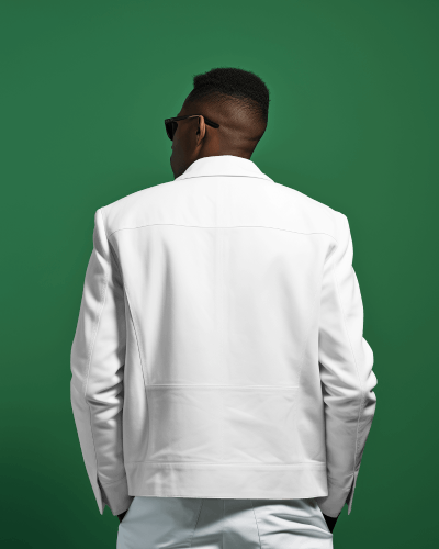 person-wearing-goggles-varsity-jacket-standing-in-front-of-green-screen