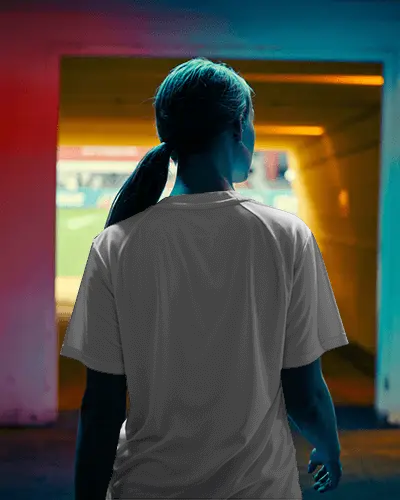 Game Time Jersey Mockup With Athlete Heading Toward Stadium Light And Crowd Energy