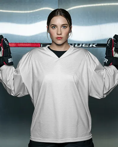Fierce Hockey Jersey Mockup With Focused Athlete Holding Stick In Bold Metallic Arena