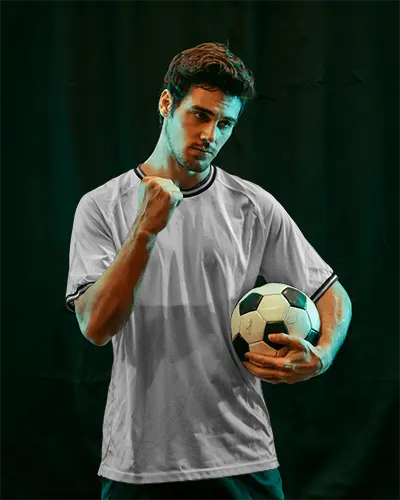 Victory Drive Soccer Jersey Mockup With Athlete Clenching Fist In Bold Studio Light