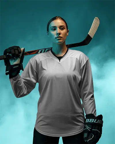 Teal Fog Hockey Jersey Mockup With Confident Athlete Holding Stick In Bold Arena Light