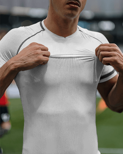 Lively Really Great Football Clothing Jersey Mockup Male Player Posing Dynamically Under Bright Stadium Lights