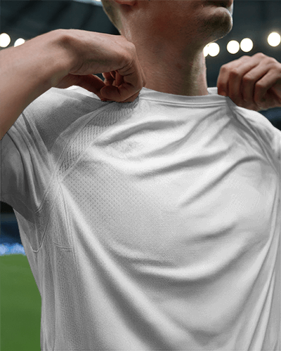 Universe Exploration Jersey Mockup Male Model Presenting Alien Artwork Under Football Stadium Lights