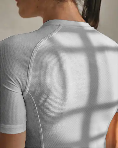 Modern Athletic Female Jersey Back View In Soft Shadow Light Bright Background For Ecommerce Showcase