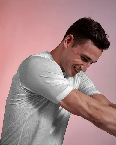 custom-branding-sports-jersey-mockup-on-male-model-in-soft-light-with-arm-raised-for-design-exposure