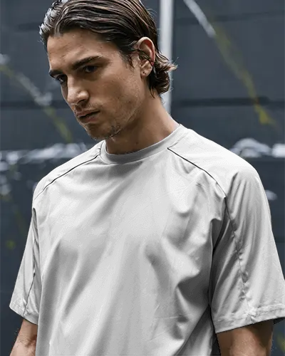 urban-sports-jersey-mockup-male-model-outdoor-setting-moody-expression-modern-athleisure-look