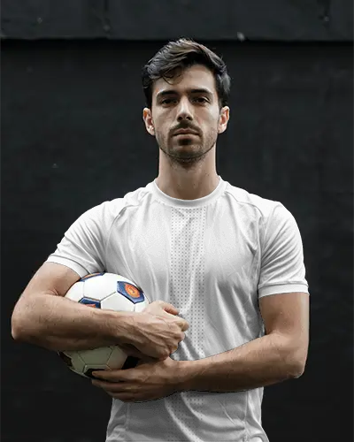 action-ready-soccer-player-posing-with-football-and-custom-design-ready-on-blank-jersey