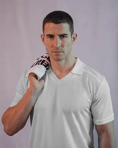 studio-white-sports-jersey-mockup-male-model-holding-gym-towel-athletic-build-front-facing-tight-fit-fabric-texture-clean-background