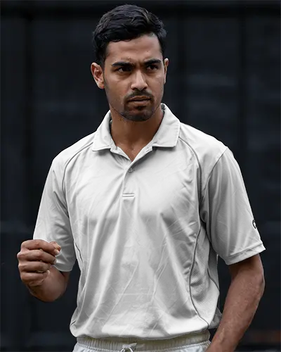 cricket-jersey-mockup-male-athlete-in-action-pose-against-dark-background-focused-expression-dynamic-sportswear-display