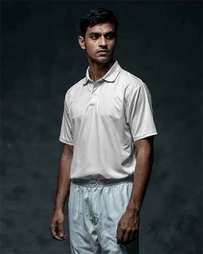 cricket-jersey-mockup-male-model-standing-in-moody-studio-lighting-professional-sportswear-focus-minimalist-background