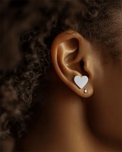 Close Up Jewelry Mockup Stud On Ear Model Dark Background Soft Focus Warm Tones Natural Lighting