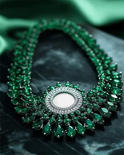 statement-necklace-mockup-on-dark-marble-glamorous-emerald-style-bold-jewelry-presentation