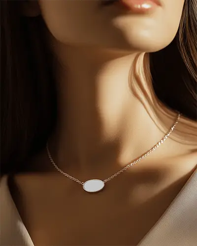 oval-necklace-mockup-on-model-neck-sculpted-light-fine-jewelry-look-with-elegant-shadowed-mood