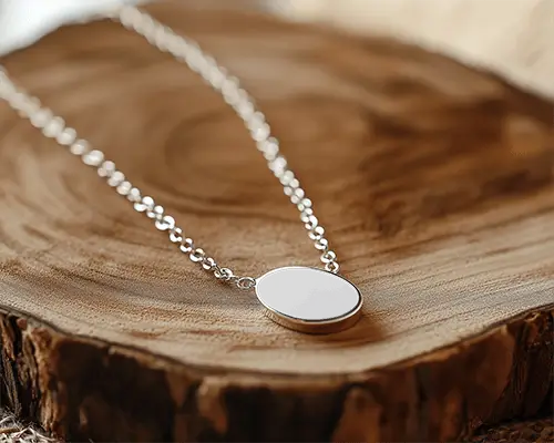 silver-pendant-necklace-mockup-on-wooden-platform-soft-daylight-classy-jewelry-in-natural-scene