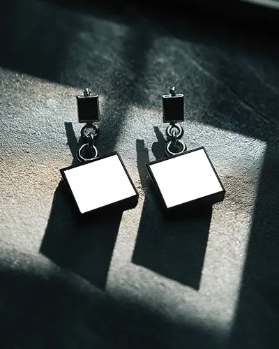 Moody Shadowed Square Drop Earring Mockup On Dark Stone Surface With Dramatic Lighting