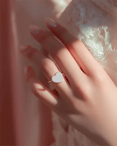 elegant-heart-shaped-ring-on-feminine-hand-minimalistic-jewelry-accessory-showcase