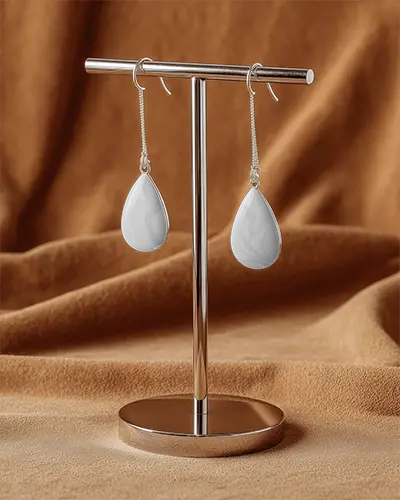 luxury-earring-design-mockup-with-hook-chain-details-on-shiny-metal-stand