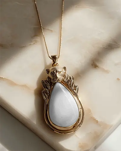 luxury-pendant-necklace-mockup-with-wild-cat-design-on-marble-background-for-branding