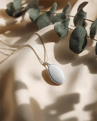 Elegant Round Pendant Necklace Mockup With Delicate Chain On Luxurious Fabric Background