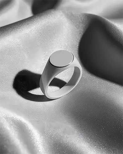 sleek-minimalist-signet-ring-mockup-on-smooth-textured-fabric-background-for-branding