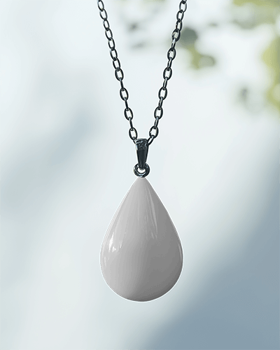Soft Bokeh Background Teardrop Pendant Mockup Hanging On Dark Metal Chain Elegant And Minimal Jewelry Display 039