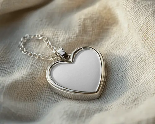Heart Shaped Locket Mockup Glossy Silver Jewelry Resting On Textured Fabric In Soft Natural Light