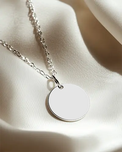 Round Swan Engraved Necklace Mockup Closeup On Minimal Drape Background Premium Jewelry Shot