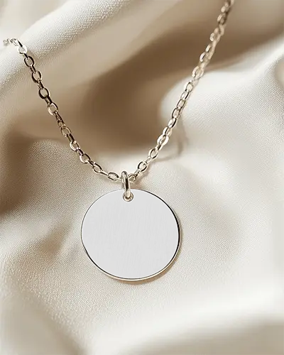 Engraved Necklace Mockup Elegant Round Pendant On Beige Satin Background Closeup Scene
